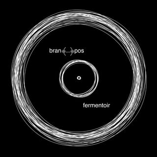 A series of white circles overlapping each other on a black backdrop resembling, perhaps, a vinyl record.